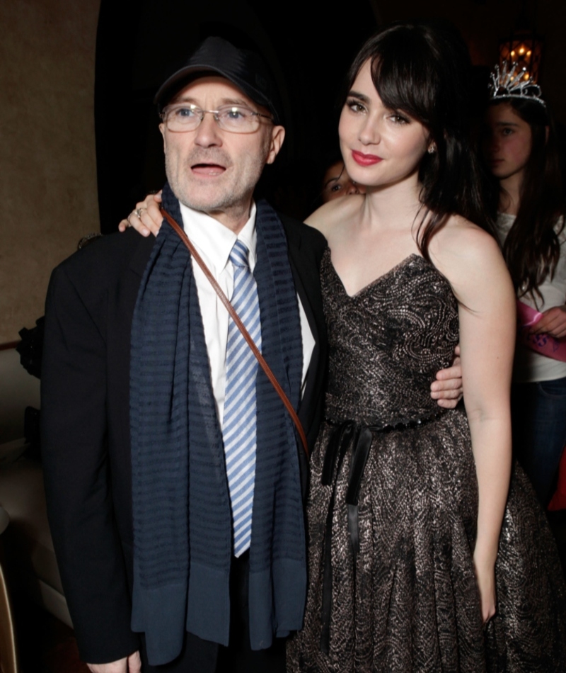 Phil Collins & Lily Collins | Getty Images Photo by Todd Williamson