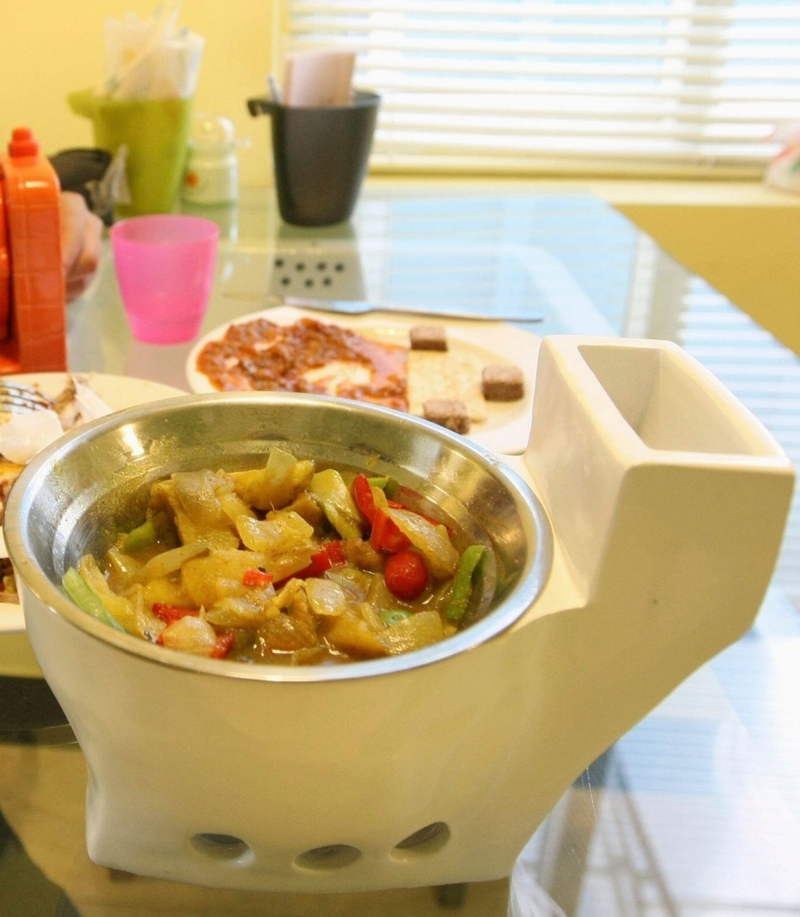 Eating Leftovers From a Toilet | Alamy Stock Photo