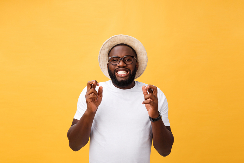 Crossing Your Fingers | Shutterstock