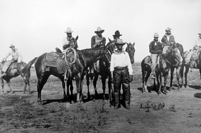 Schwarze Cowboys zu Pferd | Alamy Stock Photo by JT Vintage/Glasshouse Images 