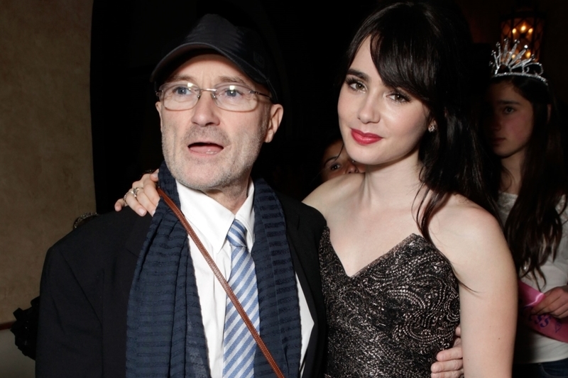 Phil Collins y Lily Collins | Getty Images Photo by Todd Williamson