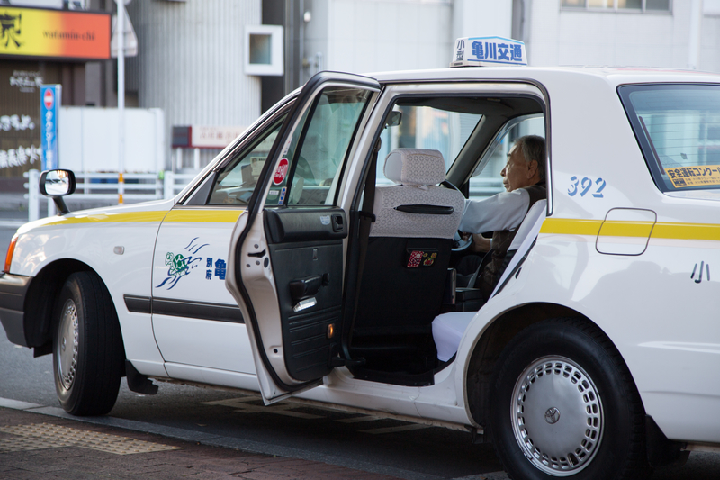 Taxi Doors | McFishoPhoto/Shutterstock 