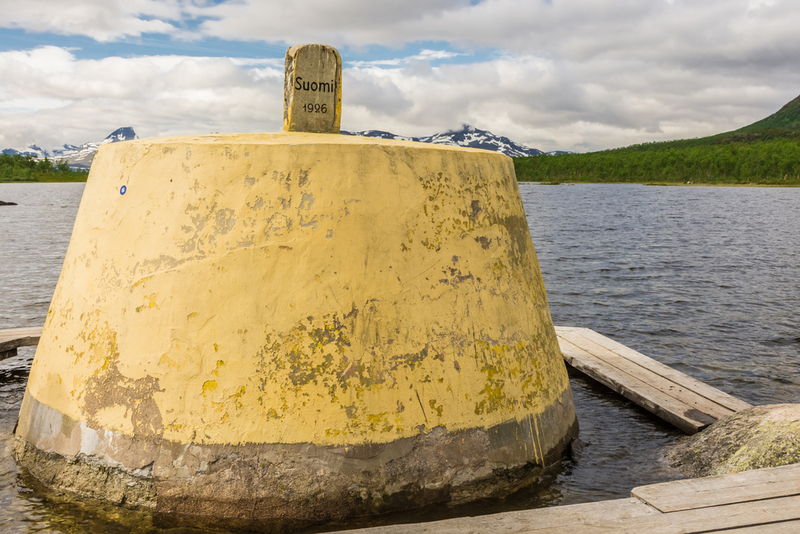 The Three-Country Cairn | Shutterstock Photo by Stefano Zaccaria