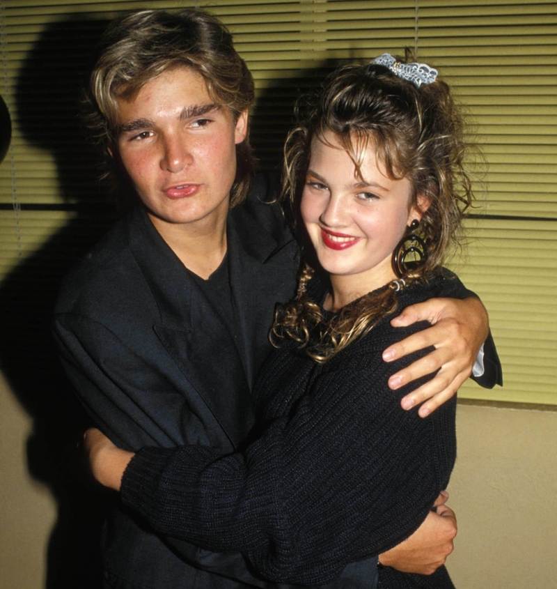 Corey Feldman and Drew Barrymore | Alamy Stock Photo