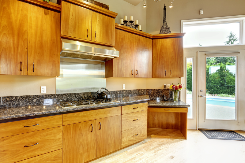 Not-So-Sweet Honey Oak Cabinets | Artazum/Shutterstock 