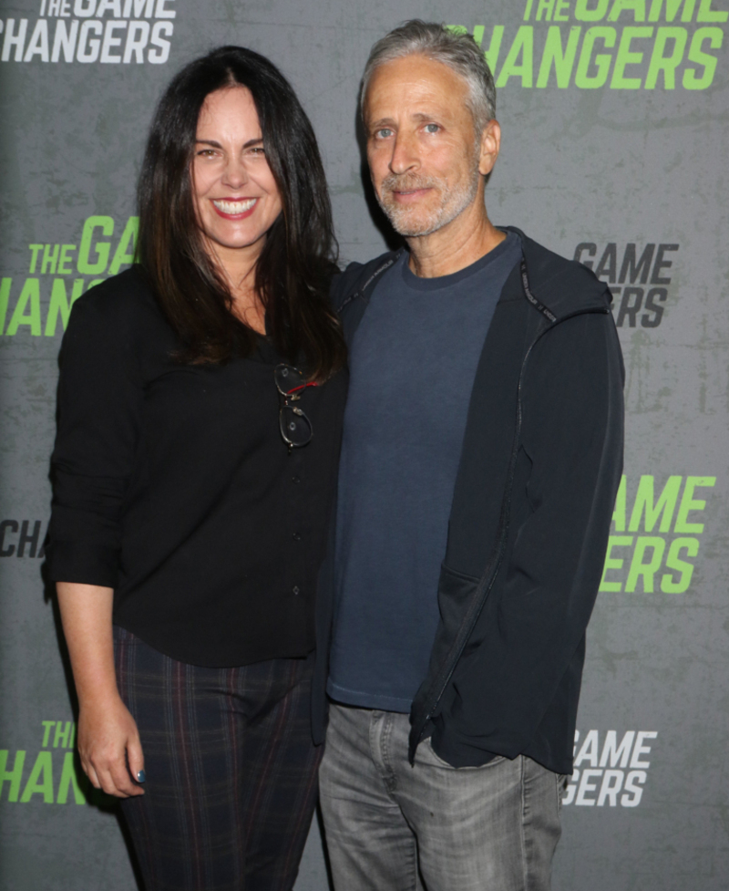 Jon Stewart and Tracey McShane | Alamy Stock Photo by RW/MediaPunch